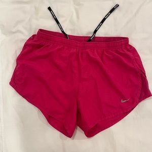 Pink Nike running shorts